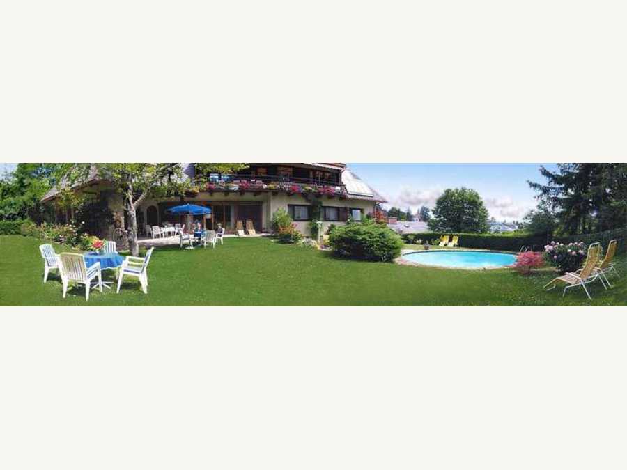 Gartenanlage mit Pool - Hotel Kurpark garni