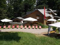 Die Stockerhütte mit Außenbereich - Almgasthof Stockerhütte
