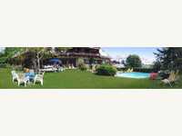 Gartenanlage mit Pool - Hotel Kurpark garni